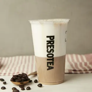 a cup of coffee and coffee beans