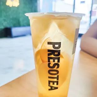 White Peach Oolong fruit tea (with fresh Apples, Oranges and Passionfruit inside)