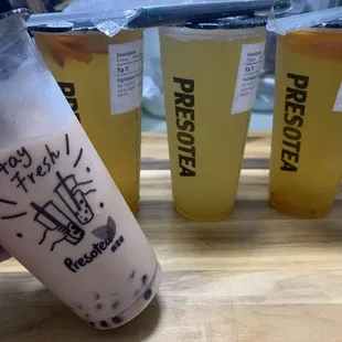 Panda milk tea, signature fruit tea, and kumquat tea.