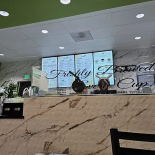 a view of a restaurant counter