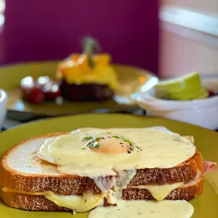 a sandwich with cheese and an egg