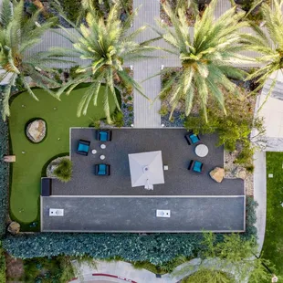 Aerial shot of continued outdoor seating and yard games.