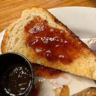 Warm toast, generously slathered in house-made strawberry basil jam!