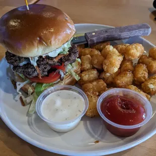 a burger and tater tots