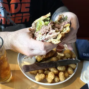 MOAB- Mother of all burgers with cheese &amp; tater tots.