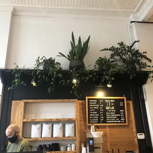 a man working at a coffee shop