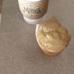 Coffee and iced lemon muffin.