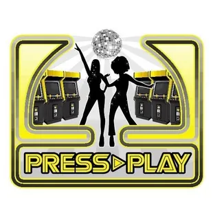 two women dancing in front of a disco ball