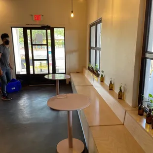 a man standing in a coffee shop