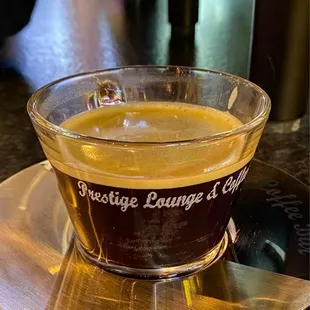 a cup of coffee on a saucer