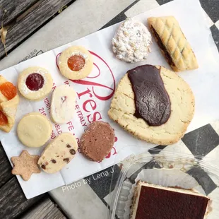 Assorted small cookies, Pignoli Cookie ($1.20), Fig Cookie ($2), Chinese Cookie ($1.50), Tiramisu Piece ($6)
