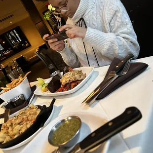 a woman eating a meal