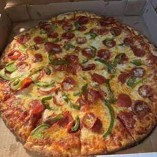 Large Pepperoni and green peppers pizza