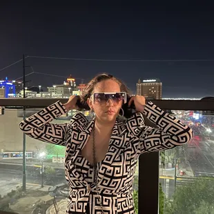 Givenchy print 2 piece suit with Versace inspired stark white shield with Medusa on sides.