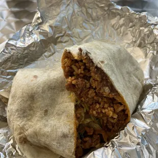 Al pastor burrito with beans and rice