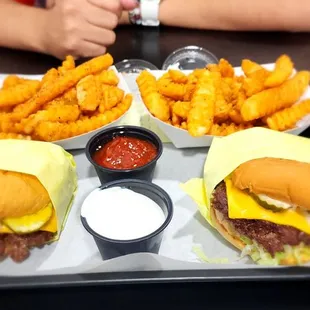a tray of fries and a burger