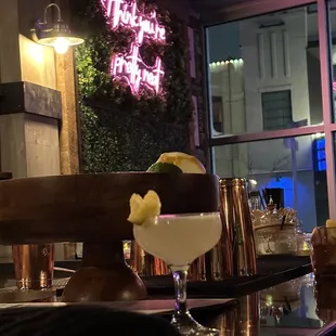 a dessert and a drink on a bar