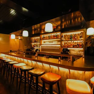 a bar with a lot of stools