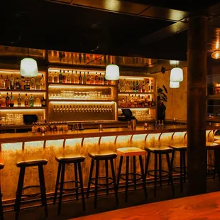 a bar with a lot of stools