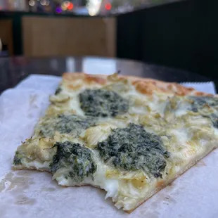 Artichoke and Spinach Slice (half eaten)