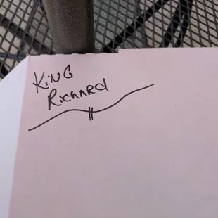 a piece of paper with a handwritten message