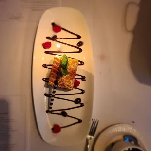 a white plate with a dessert on it