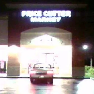 a car parked in front of the store