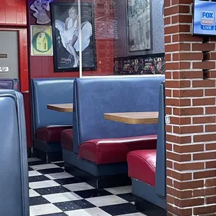 a checkered floor and booths