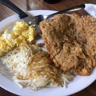 Chicken fried steak, 2 eggs and hash browns.