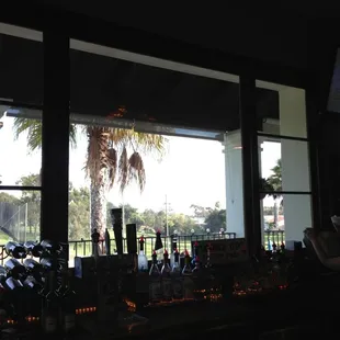 Sitting at the bar with great views.