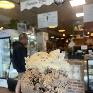 Butter pecan and cookies and cream in a cake cone
