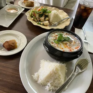 Pad Kra Pao on her plate, mine is the Tom Kha soup. Everything A+