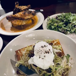 Roast chicken with polenta, salad lyonaise, and house salad.