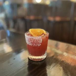 a shot of a drink on a table