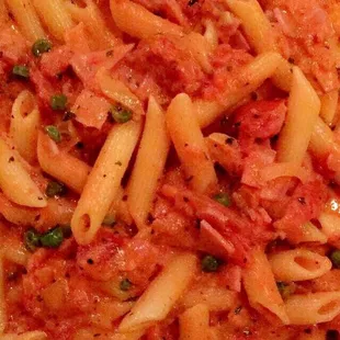 a plate of pasta with tomato sauce