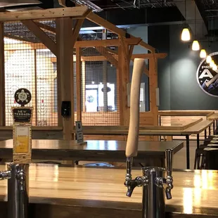 a beer tap and a bar