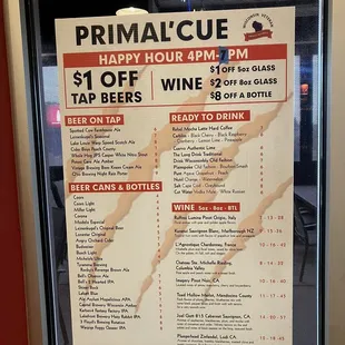 Drink menu on the door to the patio seating