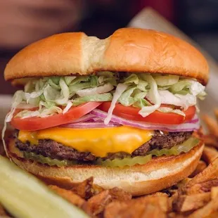 a cheeseburger and fries