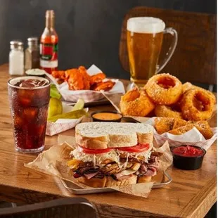 a sandwich and onion rings