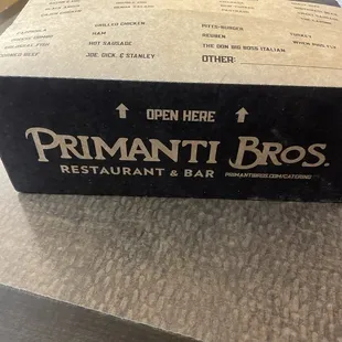 The takeout box containing the goods!