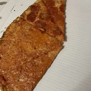 Thin crust 1/2 pepperoni &amp; 1/2 cheese.