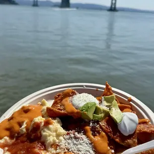 Breakfast Chilaquiles "El Cardenal" $16 with a view, head to the benches behind you