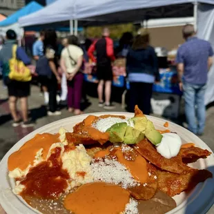 Breakfast Chilaquiles "El Cardenal" $16 total (sampling 2 different salsas self-serve) + discretionary tip jar CASH ONLY