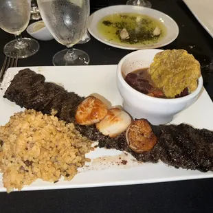 3 scallops on the side but placed on top for some reason