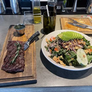 Kale salad $11.00 and 6 oz skirt steak $8.00 awesome!