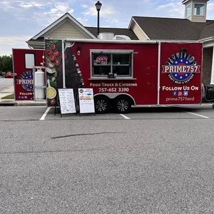 a food truck parked in a parking lot