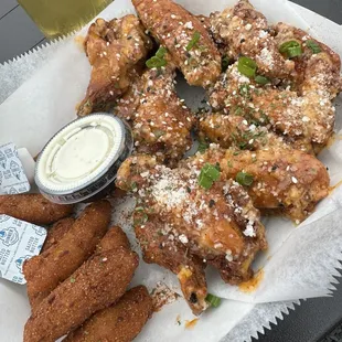 Spicy maple wings with hush puppies