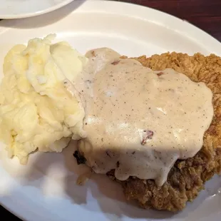 Chicken fried steak with garlic mashed potatoes