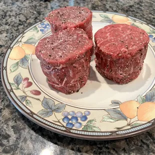 a plate of raw meat