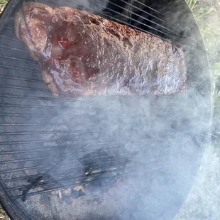 Hardwood lump coals with hickory wood chips.